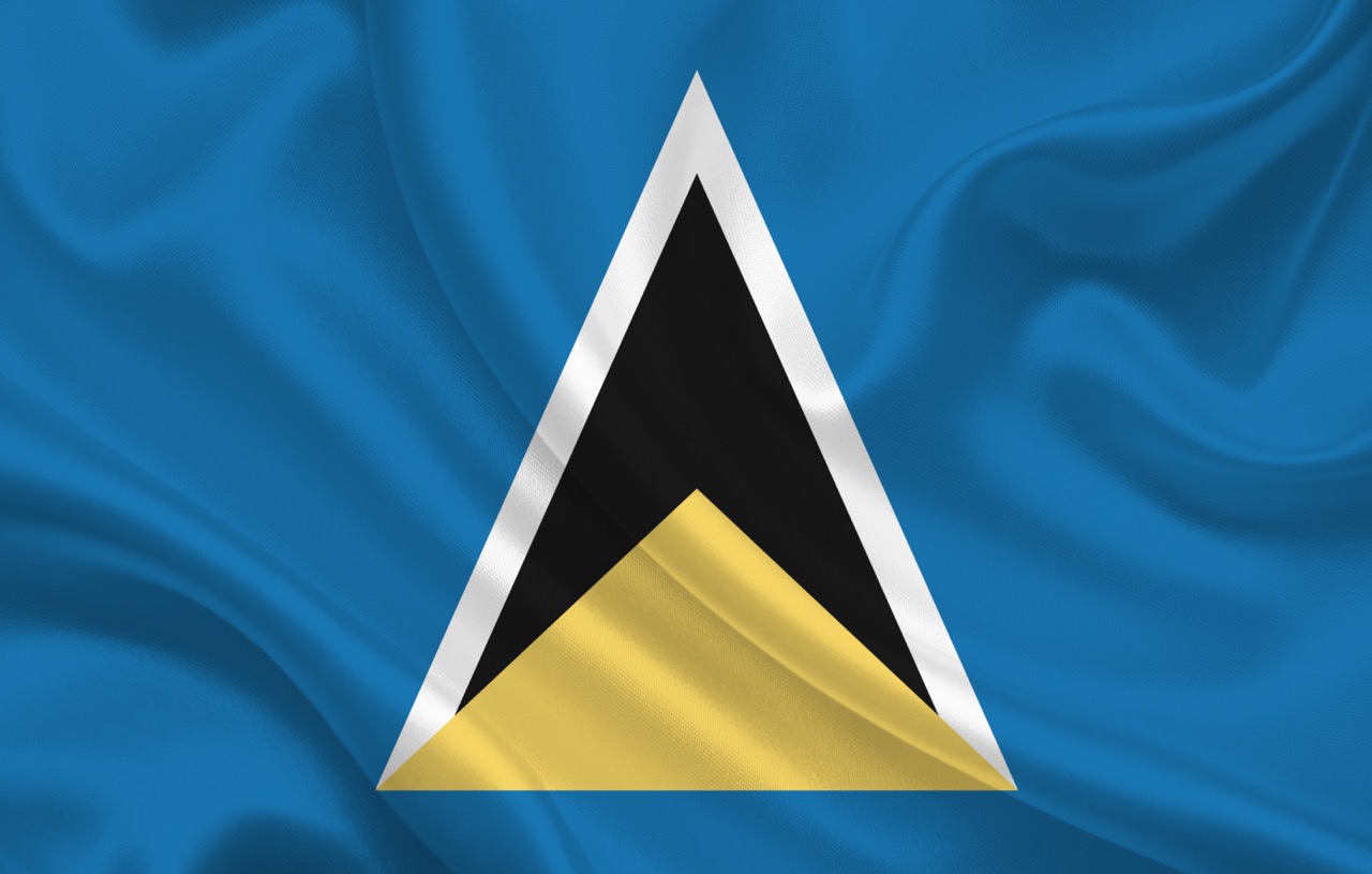 Flag of the country of Lucia on a background of wavy silk fabric panorama - illustration